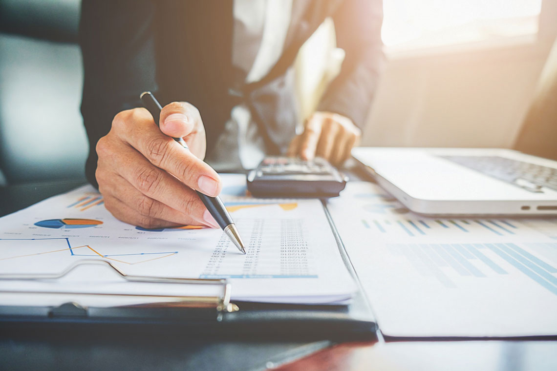 A Large Business Owner Checks Their Finances