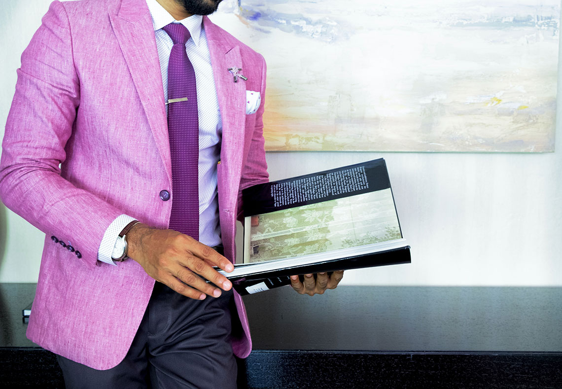 man in a magenta jacket, office clothing