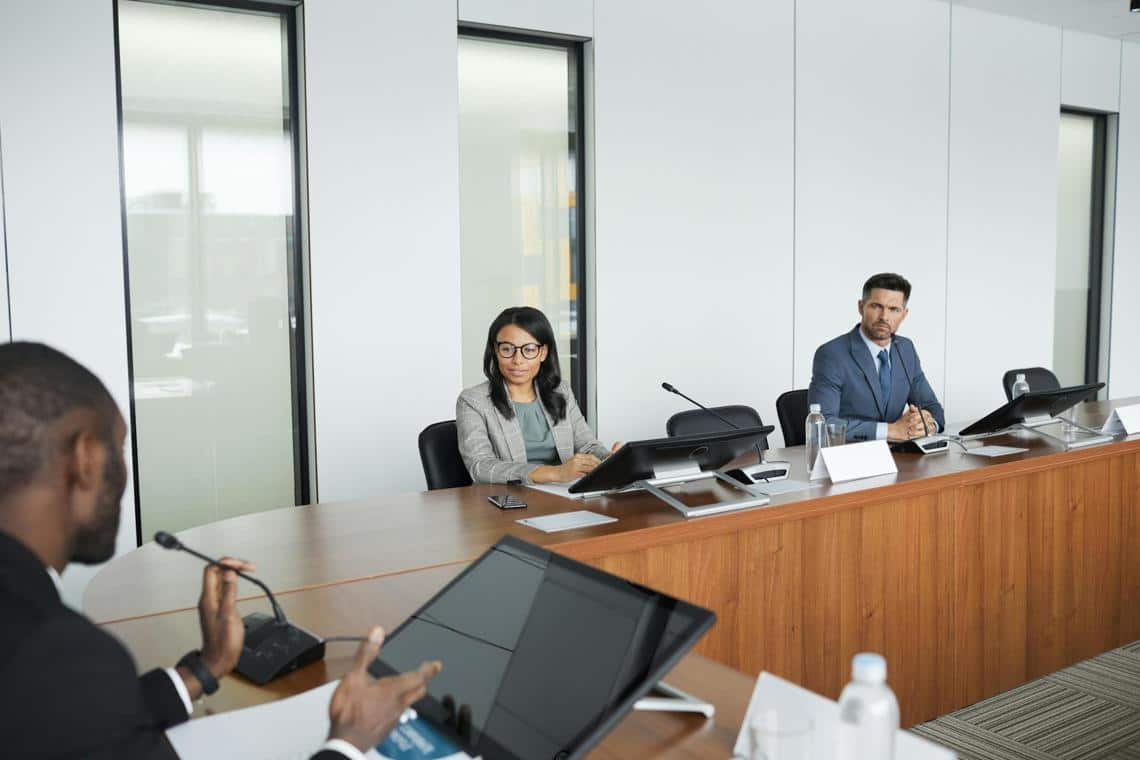 professionals in an office meeting